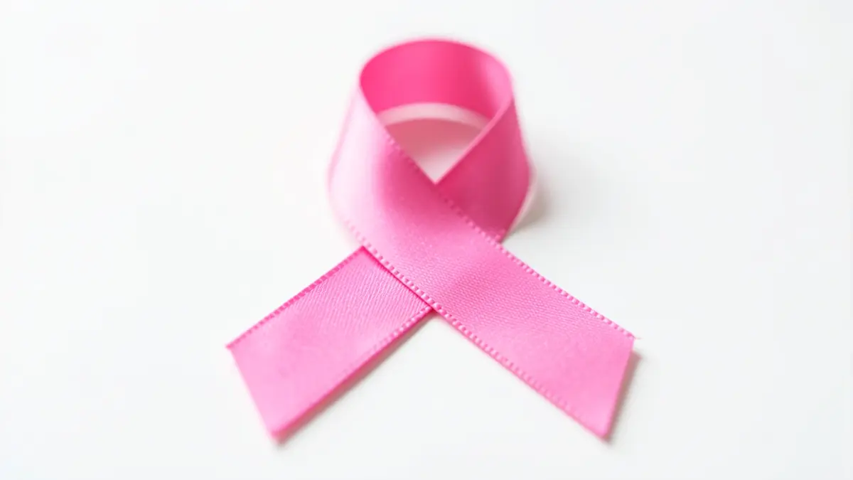 Generieke afbeelding van een roze lintje, symbool voor borstkankerbewustzijn.